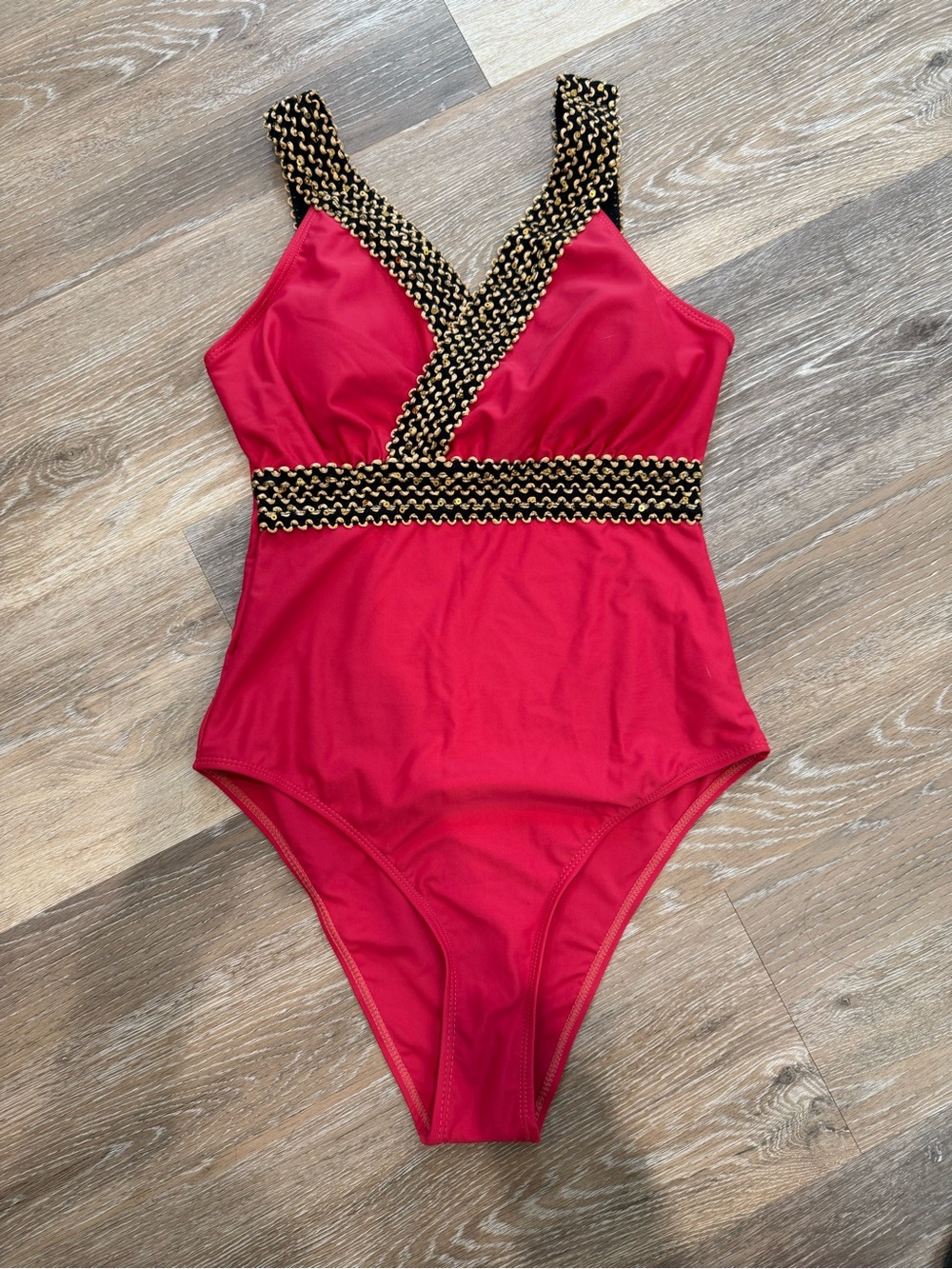 Women's Pink One-Piece Swimsuit with Gold-Trimmed Accents
